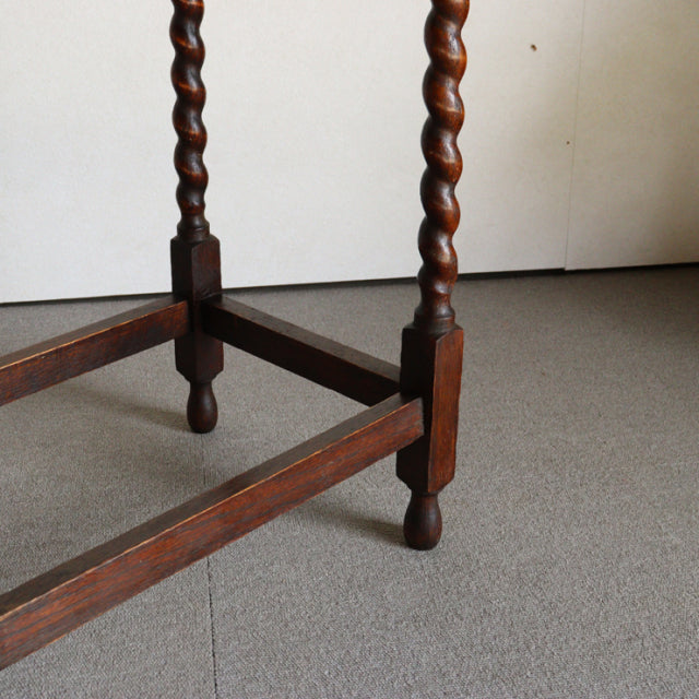 Vintage British teak side table legs with twisted barley twist design and sturdy cross supports in mid-century Denmark style.