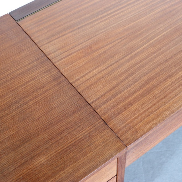 Vintage teak sideboard top showing rich wood grain and smooth mid-century British craftsmanship by Fyne Ladye Furniture.