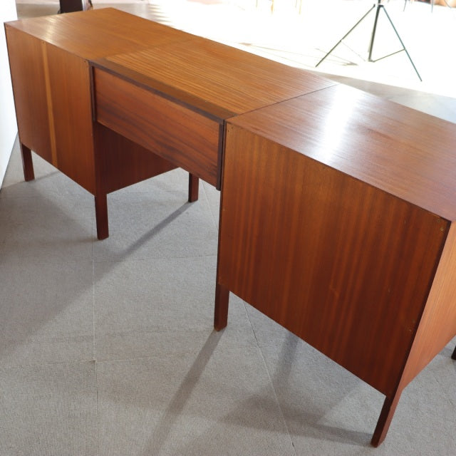 Mid-century vintage teak sideboard by Fyne Ladye Furniture, British design with rich wood grain and slender tapered legs,.