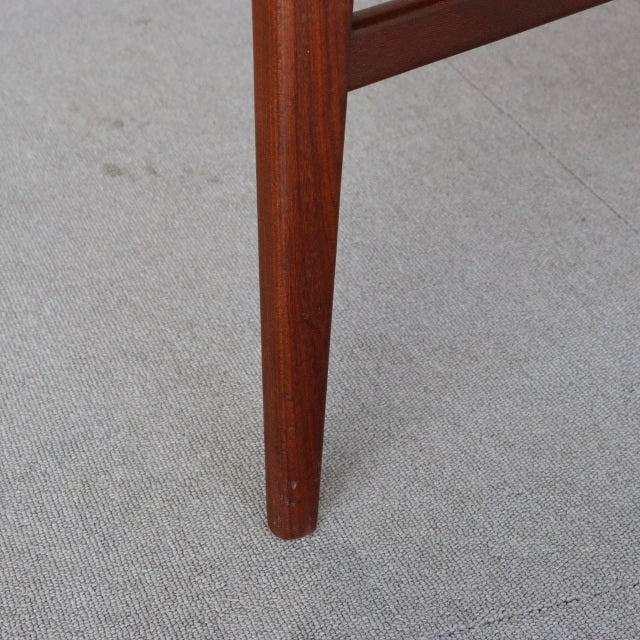 Mid-century British vintage teak dining chair leg with smooth wood grain and tapered design from Younger John Herbert.