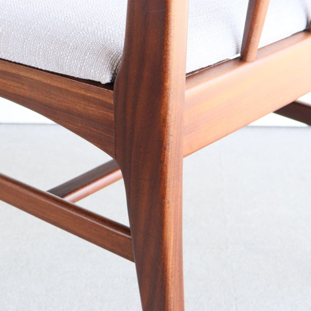 Mid-century teak dining chair leg with visible wood grain and smooth British craftsmanship by Younger designed by John.
