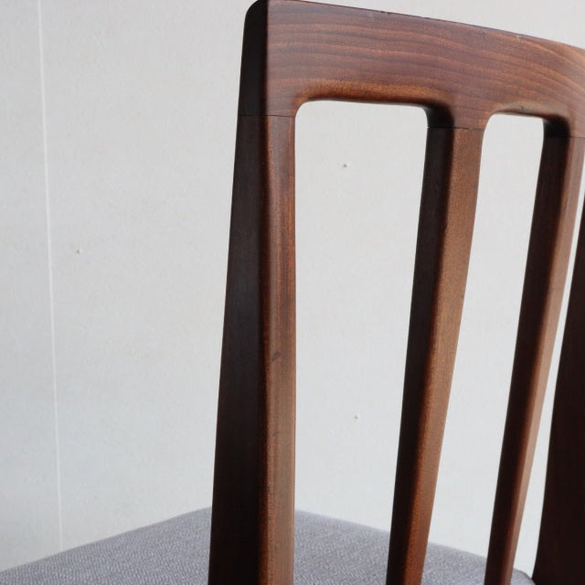 Vintage teak dining chair backrest with sleek vertical slats, mid-century British design by Younger John Herbert for Fonseca .