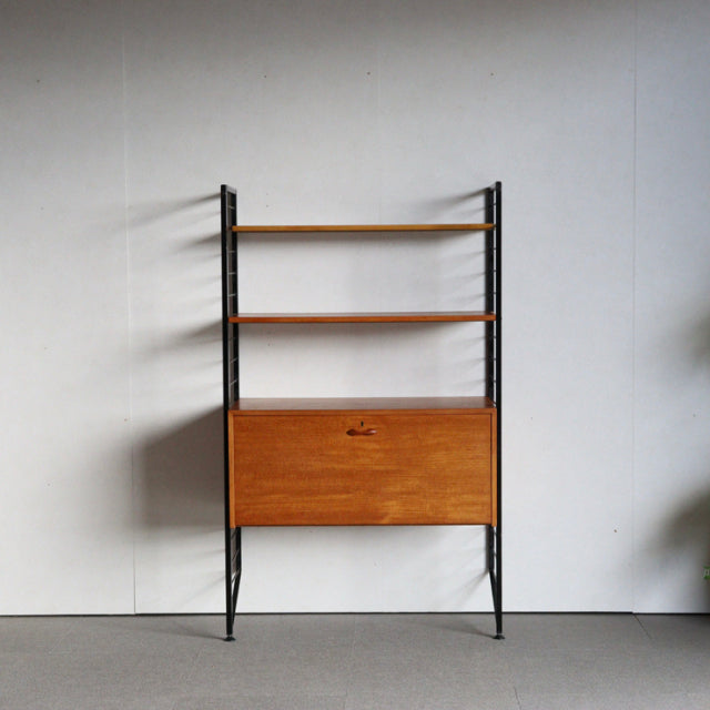 Vintage teak Ladderax ladder rack unit shelf by Staples, British mid-century design with black metal frame, three wooden.