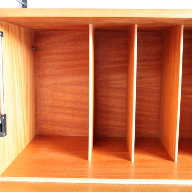 Vintage teak Ladderax shelving unit with divided compartments, clean mid-century British design, smooth wood grain visible.