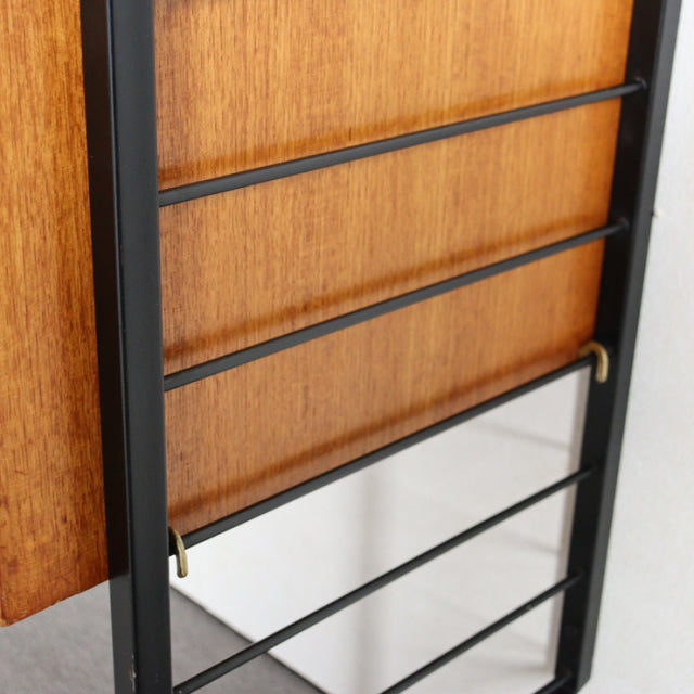 Vintage Ladderax shelving unit with teak wood panels and black metal frame, mid-century British design from Denmark,.