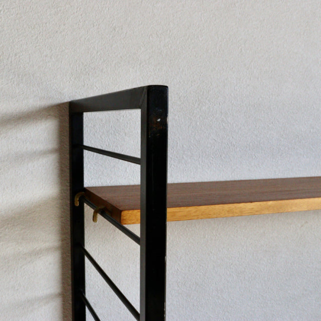 Vintage British Ladderax shelving unit with teak wood shelf, black metal frame, mid-century modern design from Denmark.