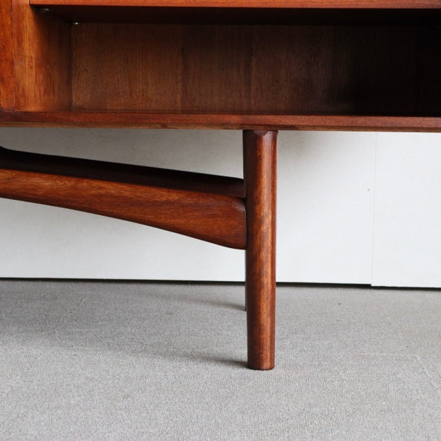 Mid-century British teak sideboard leg with rich wood grain and smooth rounded edges, vintage Dalescraft design.
