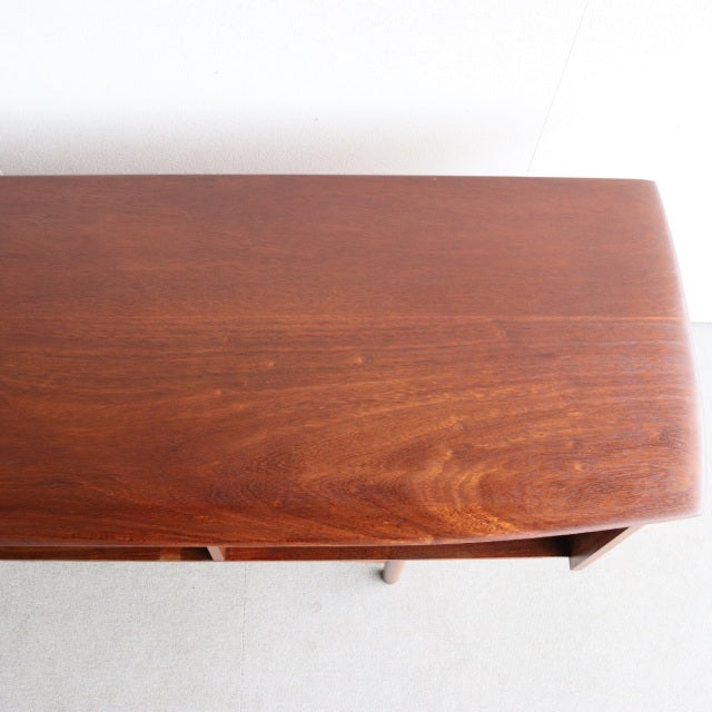 Vintage teak sideboard top with rich wood grain and smooth finish, British mid-century design.