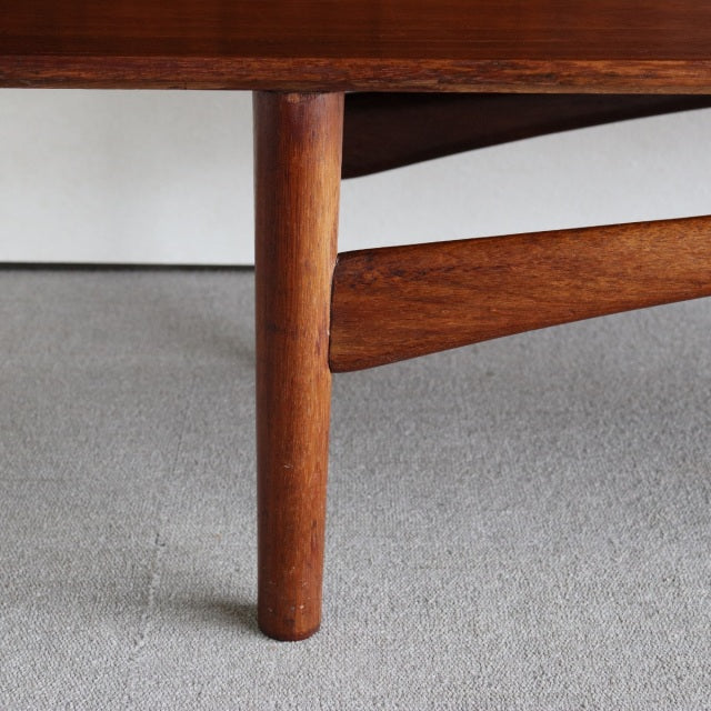 Mid-century British teak sideboard leg with visible wood grain and angled support beam from Dalescraft vintage furniture.