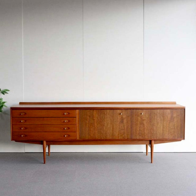 Mid-century British vintage teak sideboard by Robert Heritage for Archie Shine with smooth wood grain, four drawers on left, .