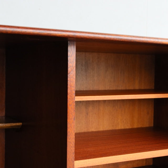Vintage teak Dalescraft sideboard shelving with rich wood grain and mid-century British design.