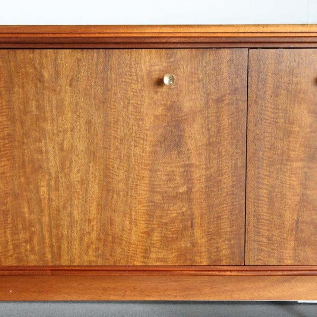 Mid-century British teak sideboard by Robert Heritage with rich wood grain and brass knob.