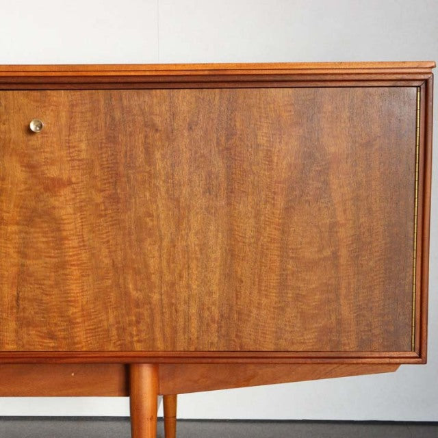 Vintage teak sideboard door panel with rich wood grain, mid-century British design by Robert Heritage for Archie Shine.
