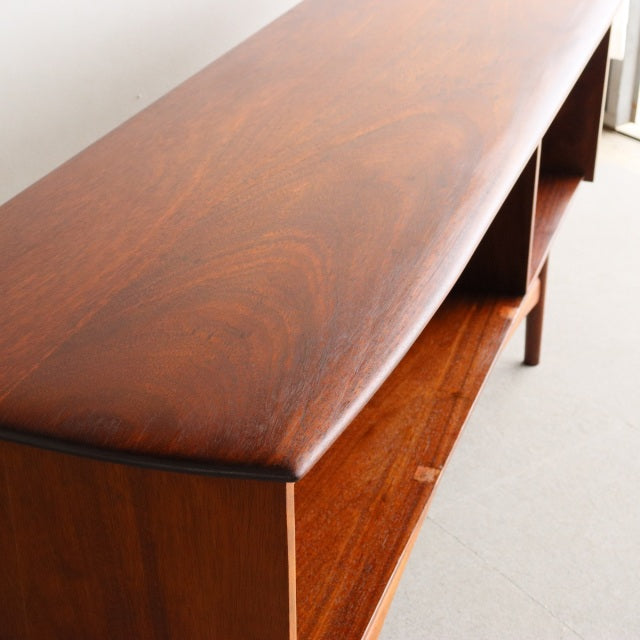 Mid-century vintage teak sideboard by Dalescraft with smooth wood grain and tapered legs, British and Danish design influence.
