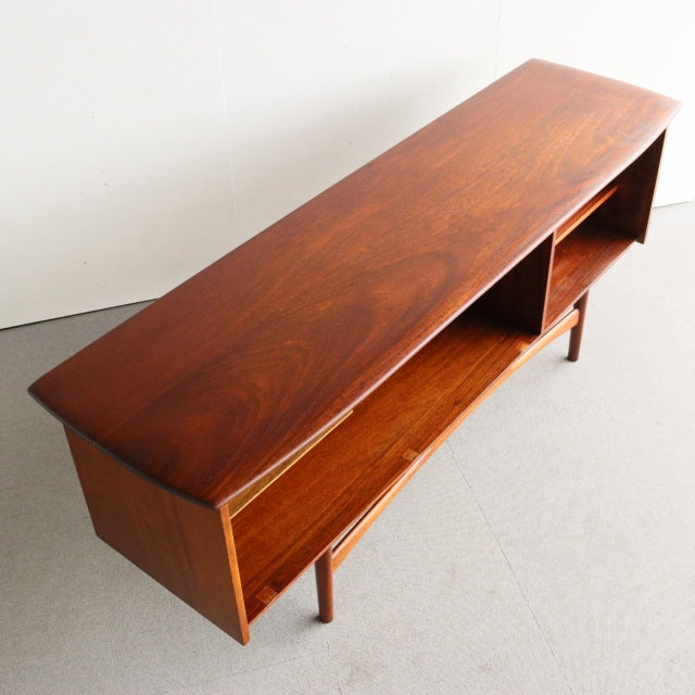 Mid-century teak Dalescraft sideboard with rich British wood grain and slender tapered legs, vintage Danish design.