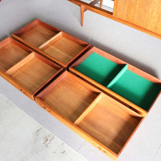 Vintage teak mid-century British sideboard by Robert Heritage for Archie Shine, open drawers reveal fine wood grain and.