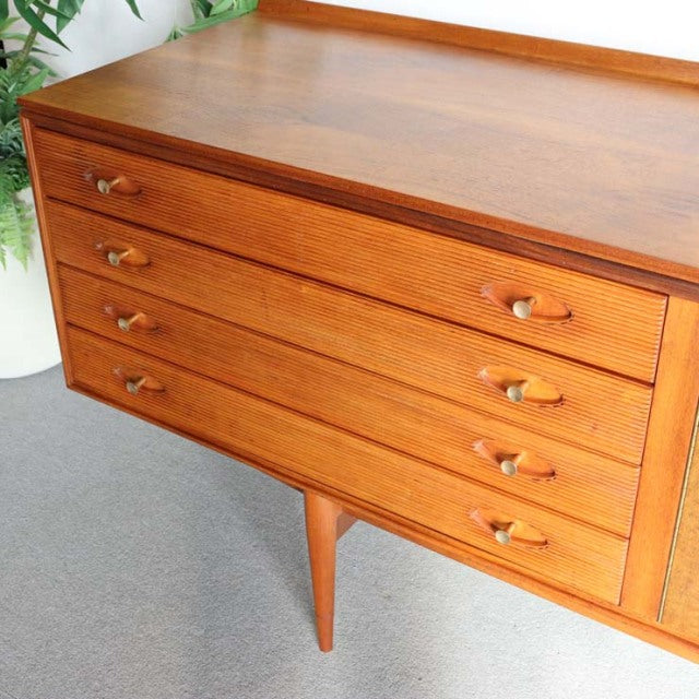 Vintage mid-century teak sideboard by Robert Heritage for Archie Shine, British design with warm wood grain and tapered legs.