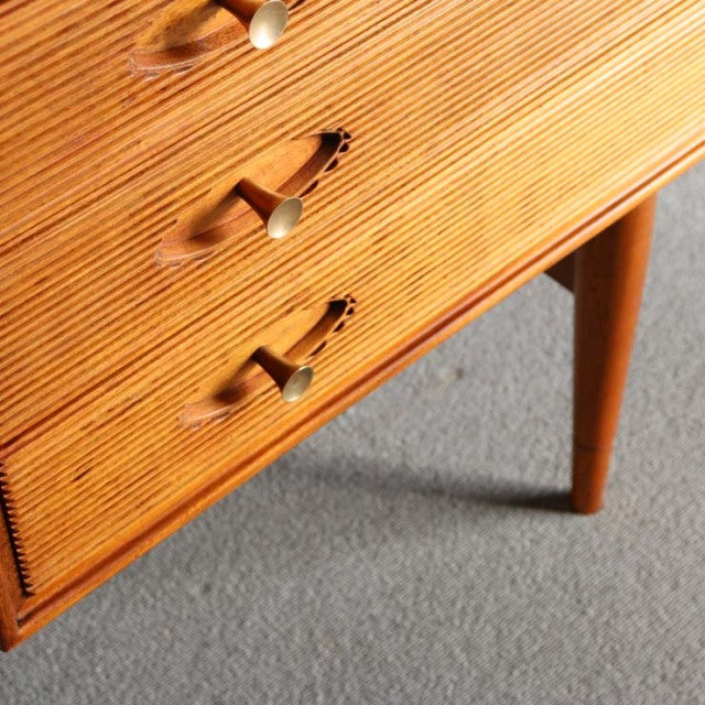 Mid-century British vintage teak sideboard by Robert Heritage with sleek angled legs and distinctive wood grain.