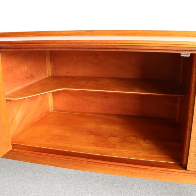 Open teak sideboard compartment showing rich wood grain and mid-century British design by Robert Heritage for Archie Shine.