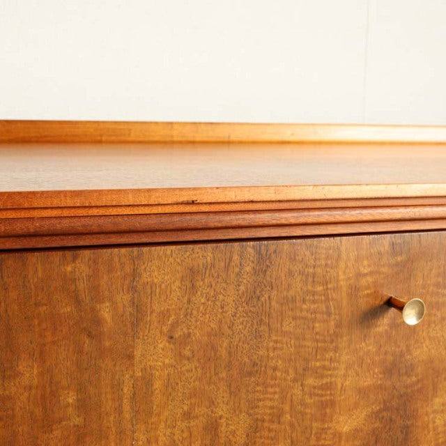 Mid-century British vintage teak sideboard by Robert Heritage for Archie Shine, detailed wood grain and brass knob.