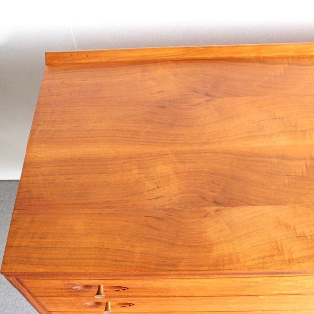 Mid-century teak sideboard top showing rich wood grain and warm British vintage finish by Robert Heritage and Archie Shine.