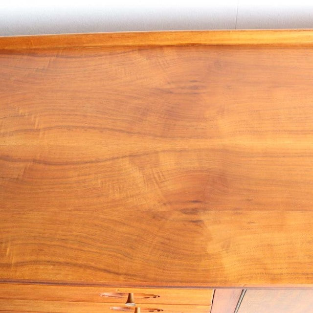 Mid-century British vintage teak sideboard top with rich wood grain and smooth finish.