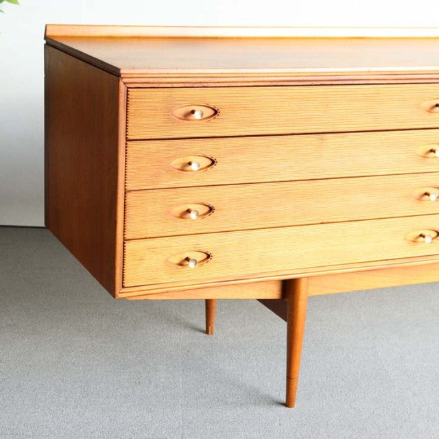 Vintage teak mid-century sideboard by British designer Robert Heritage for Archie Shine, showcasing rich wood grain, four.