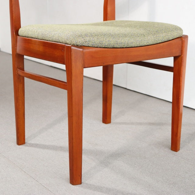 Vintage teak mid-century dining chair by Nathan, British-Danish style with clean wood grain and upholstered seat cushion.