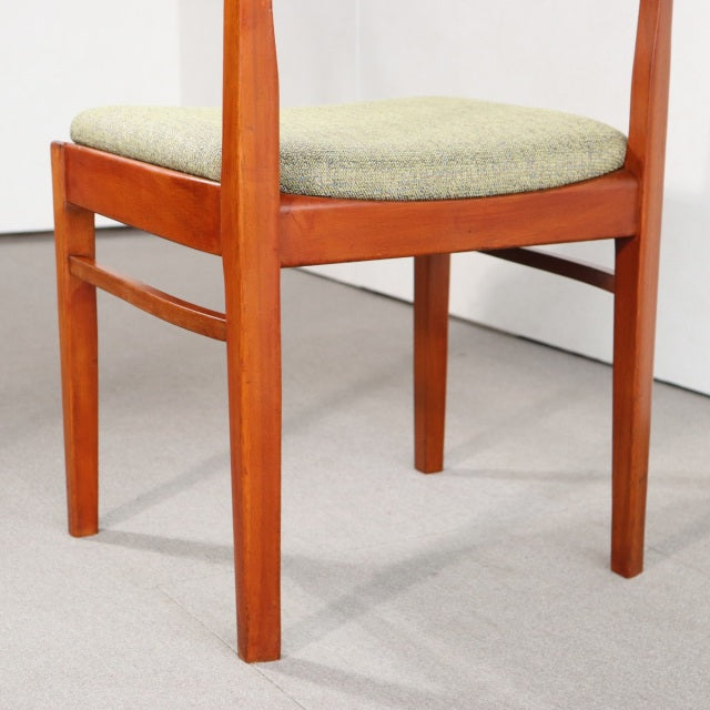 Vintage NATHAN mid-century teak dining chair with beige upholstered seat and tapered wooden legs, British-Danish design.