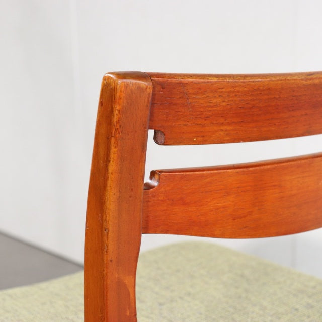 Vintage teak dining chair backrest with rich wood grain, mid-century British design from Nathan.