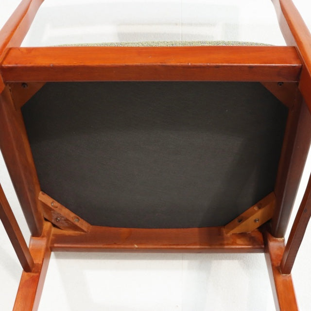 Vintage teak dining chair seat base with sturdy wooden frame and visible grain, mid-century British design from Denmark.