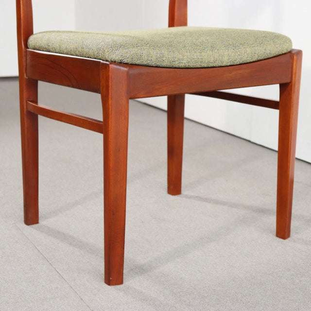 Mid-century British vintage teak dining chair by NATHAN with green upholstered seat and tapered legs.