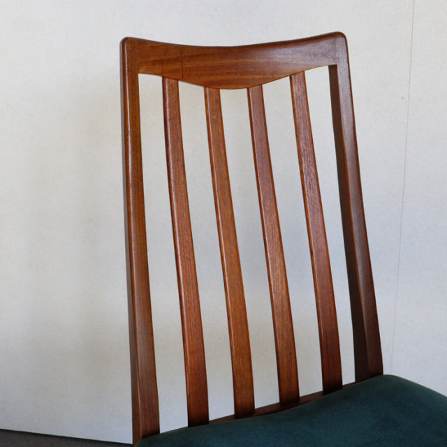 Vintage British mid-century G-PLAN dining chair with teak wood slatted back and teal green upholstered seat.