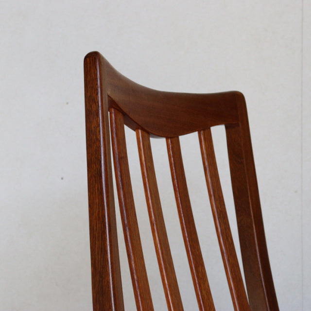 Mid-century vintage teak dining chair by British G-PLAN with vertical slatted backrest in rich brown wood grain.