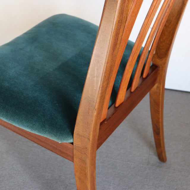 Vintage British mid-century G-PLAN dining chair with teak frame and teal green upholstered seat, showcasing wood grain and.