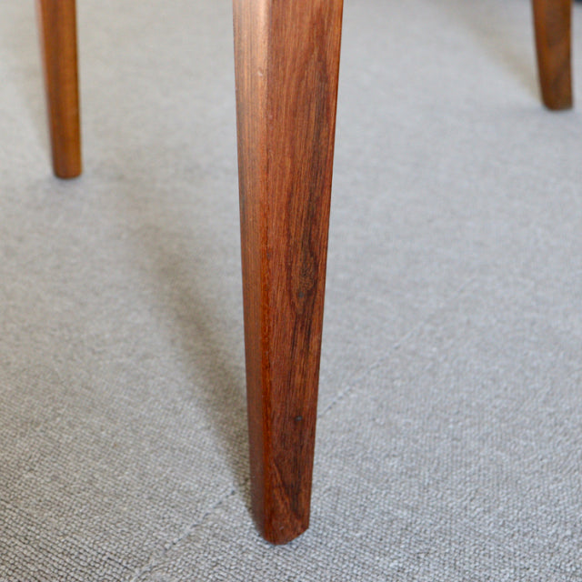 Mid-century teak dining chair leg from British G-PLAN Fresco series, showing rich wood grain and smooth finish.