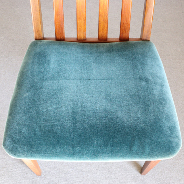 Vintage mid-century teak dining chair by British brand G-PLAN with teal green velvet seat and slatted backrest.