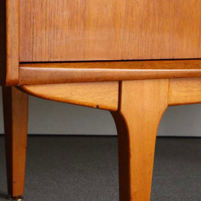 Mid-century teak sideboard leg with visible wood grain and rounded edge, British vintage style by Jentique.