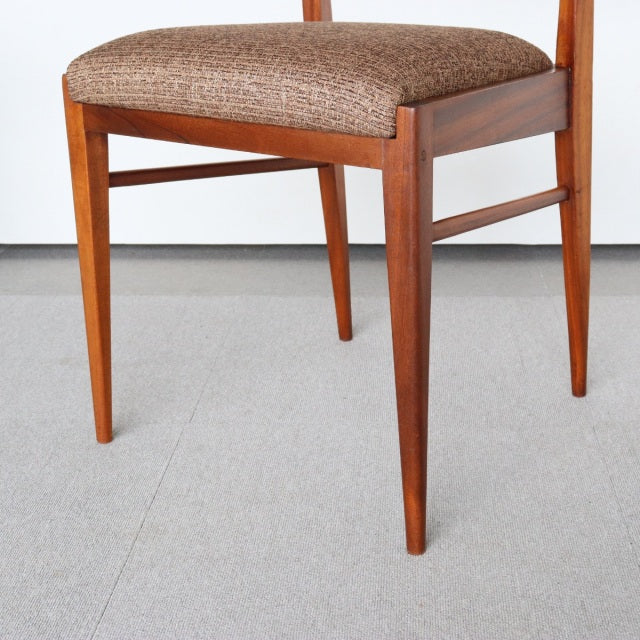 Mid-century British vintage dining chair by McIntosh with teak frame and tweed upholstered seat, slender tapered legs, and.