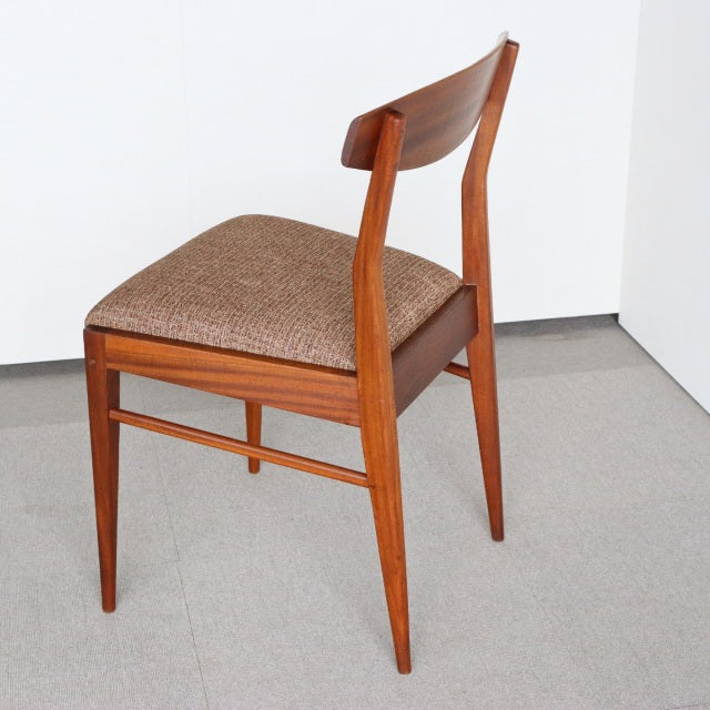 Vintage McIntosh teak dining chair with mid-century British-Denmark design, tapered legs, and brown upholstered seat.