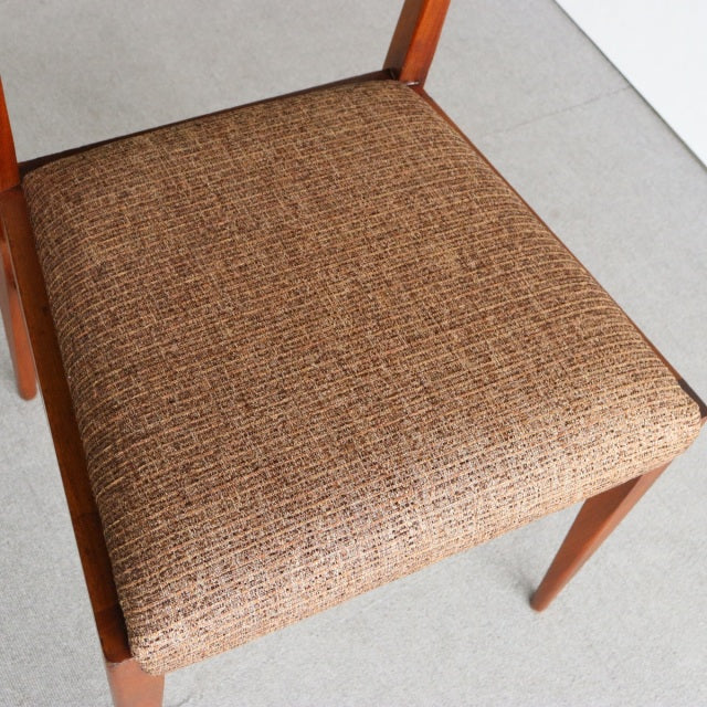 Vintage McIntosh mid-century teak dining chair seat with textured brown fabric upholstery and tapered wood legs.