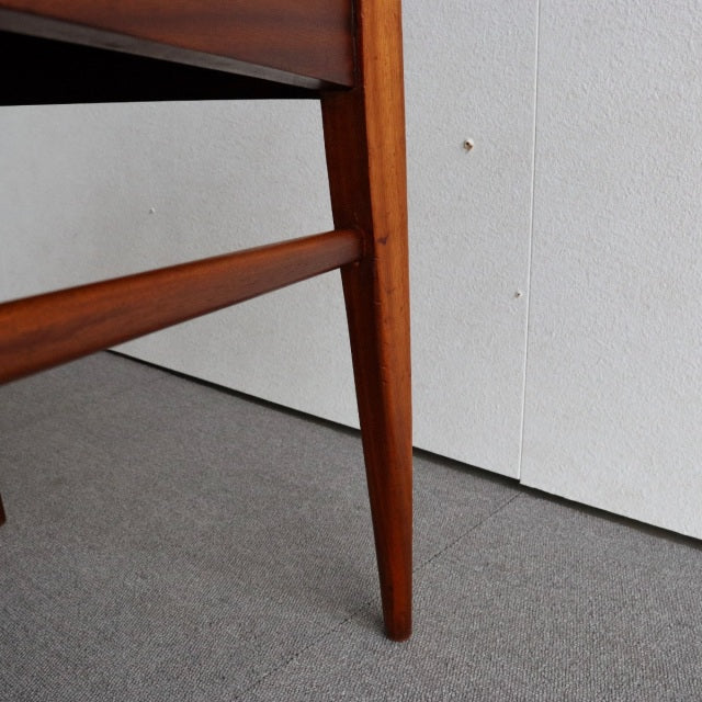 Mid-century British McIntosh dining chair leg in warm vintage teak with smooth grain and tapered design from Denmark.