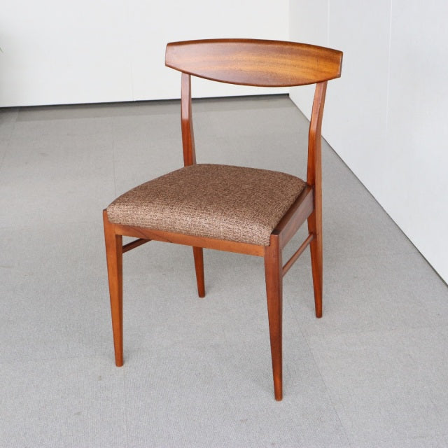 Vintage mid-century teak dining chair by McIntosh, British design from Denmark with curved backrest and brown upholstered.