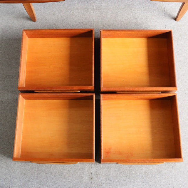 Set of four vintage teak drawers with rich wood grain, smooth interiors, and clean mid-century British design by G-PLAN.