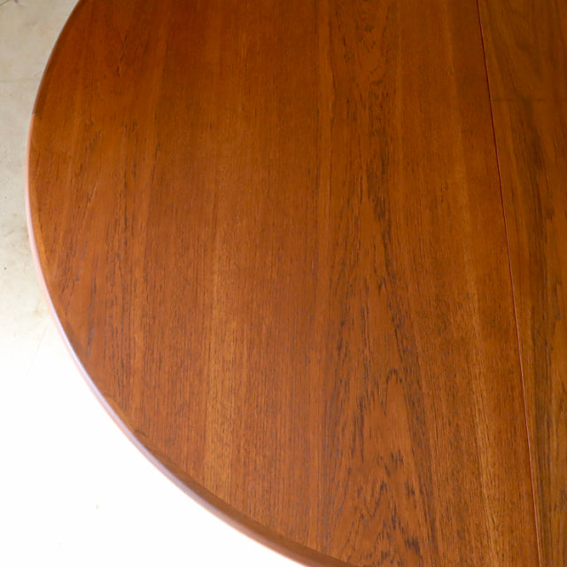 Oval-shaped vintage teak dining table top showcasing rich wood grain and smooth mid-century British craftsmanship from G-Plan.