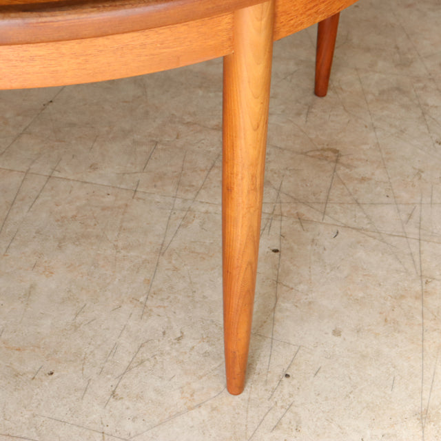 Mid-century British vintage G-Plan dining table leg in warm teak with smooth grain and tapered design.