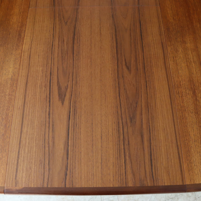 Vintage G-Plan teak dining table top with rich wood grain, classic mid-century British design from Denmark.