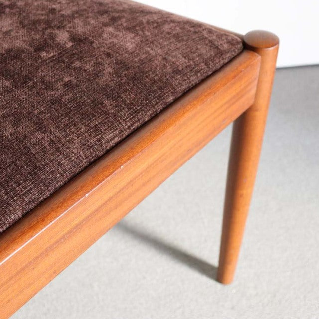 Vintage teak dining chair by Meredew with mid-century British-Denmark design, brown textured fabric seat, and tapered.