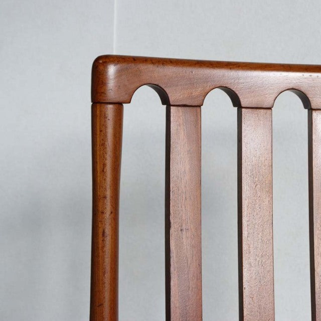 Vintage teak Meredew dining chair backrest with smooth curved top rail and vertical slats, British mid-century Denmark design.