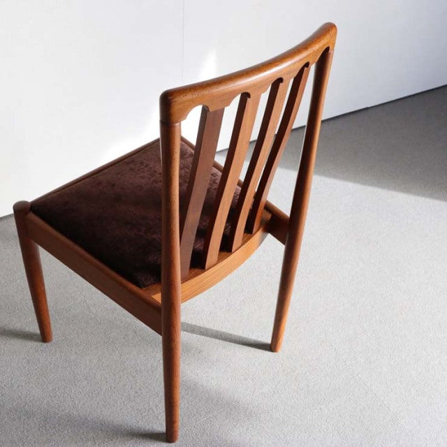 Vintage Meredew teak dining chair with British mid-century Danish design, slatted backrest and tapered legs.